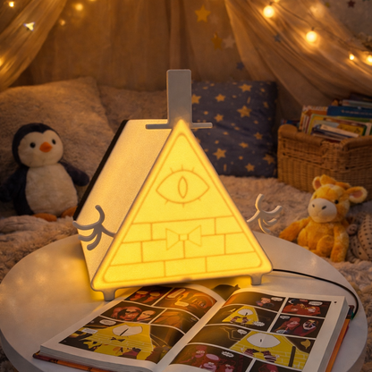 Children's room with a pyramid-shaped lamp, open book, and plush toys.